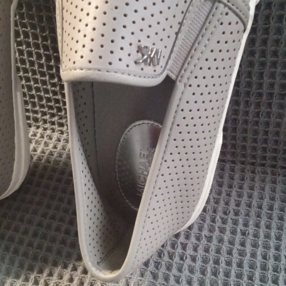 Women's Michael Kors Gray Perforated Leather Slip On Casual Sneaker Shoe - Picture 6 of 9